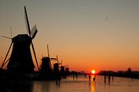 Mit Sonnenaufgang auf dem Schlittschuh am Kinderdijk