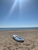 Paddleboard on the beach.