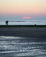 Zonsondergang op het strand in Callantsoog