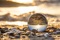Jouer au ballon sur la plage