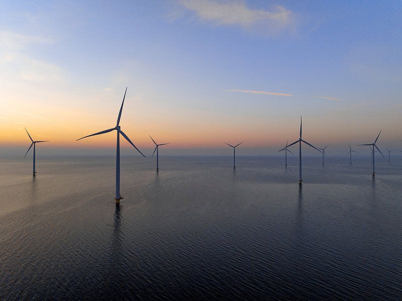 Wind turbines in an offshore wind park during sunset by Sjoerd van der Wal Photography