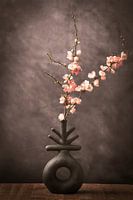 Vase with pink flowers