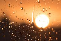 Sun through raindrops