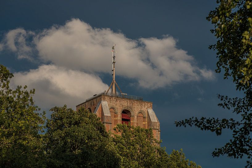 The Leeuwarder icon, The Oldehove, in the late evening sun and tinted clouds by Harrie Muis