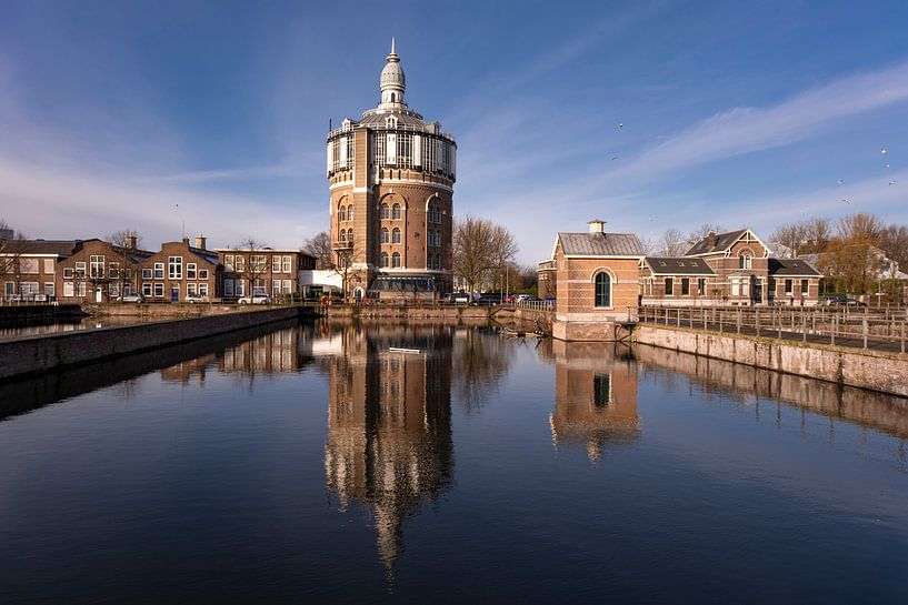 Reflection of historic water tower in a district of Rotterdam, the Netherlands by Tjeerd Kruse