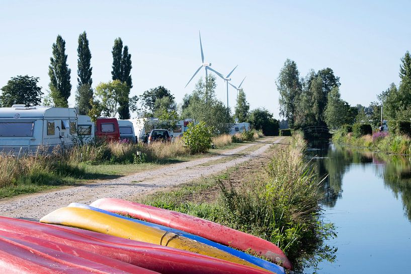 Canoes on the campsite by Mirjam Welleweerd