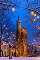 Our Lady Church in the blue hour with snow and Christmas lights