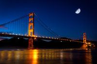 Golden Gate Bridge in San Francisco at night with moon