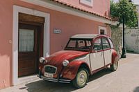 Citroën 2CV in ancient Greek town.