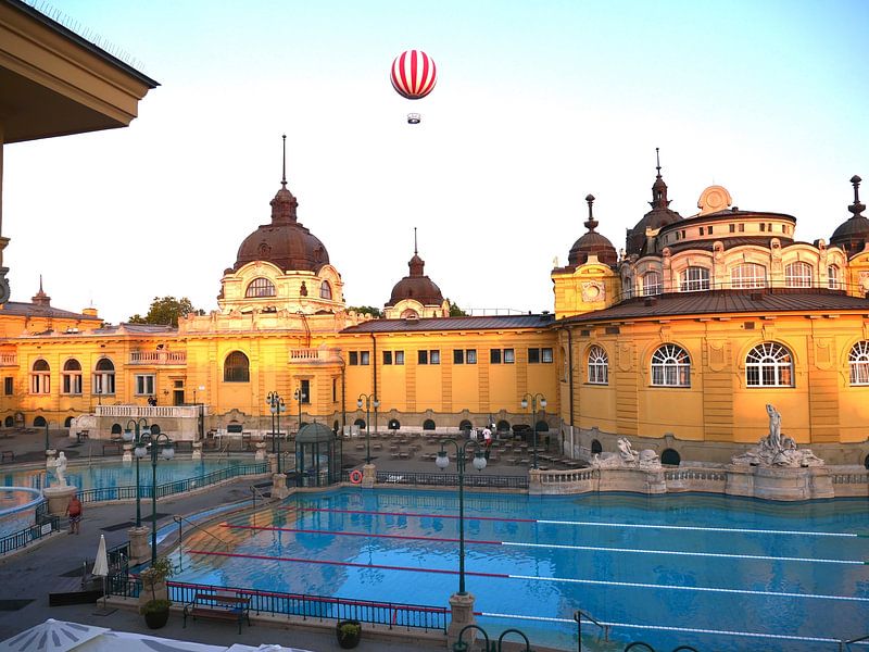 A hot air balloon over the Széchenyi bath. by Judith van Wijk