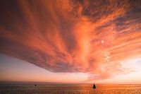 Zonsondergang met boei.