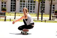 Girl on skateboard.