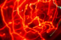 Abstraktes bewegtes Kerzenlicht in Rot