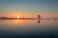 Sonnenaufgang am Bach,