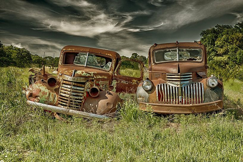 Two sleeping beauties in a car graveyard by Humphry Jacobs