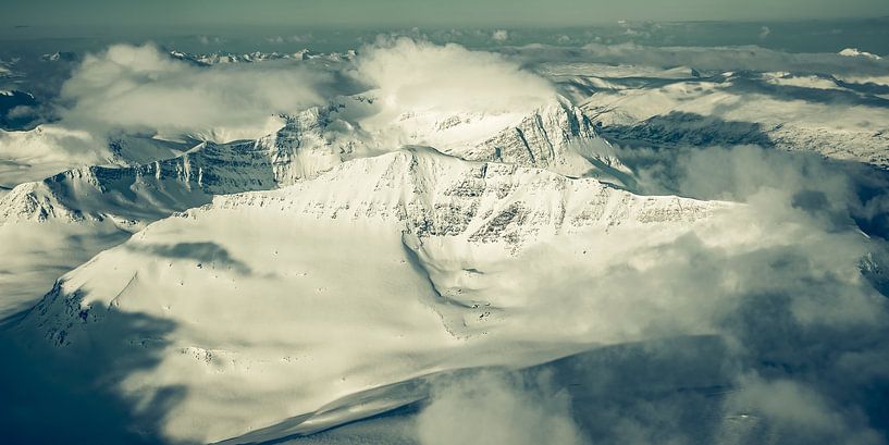 Norway during winter aerial view with snow covered mountains by Sjoerd van der Wal Photography