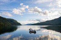 Awsome tranquil bay with a boad in Puyuhuapi on the carretera austral