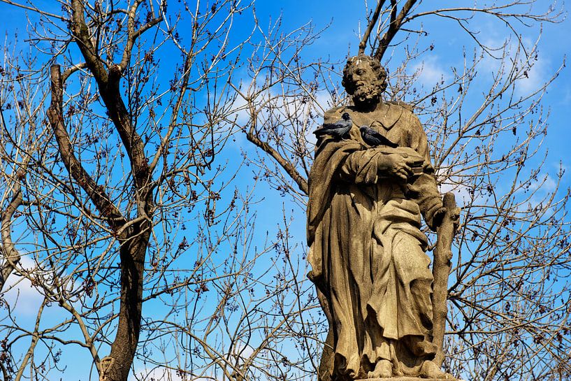 Statue with two kowls sitting on it by Rene du Chatenier