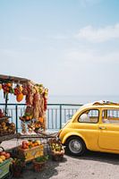 Vintage yellow fiat 500 in the Amalfi Coast