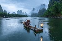 Kormoran Fischer Li Fluss China im Regen