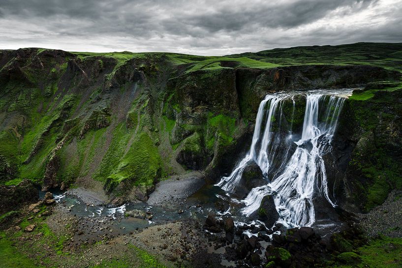 The moss-encrusted Fagrifoss waterfall (Iceland) by Martijn Smeets