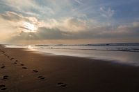 wolkenlucht aan zee, zonsondergang
