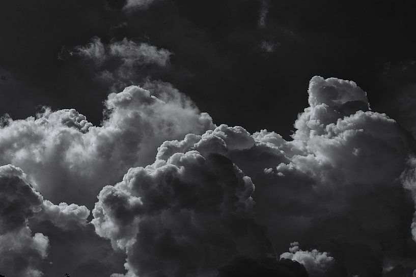 Black and white cumulus clouds by Caught By Light
