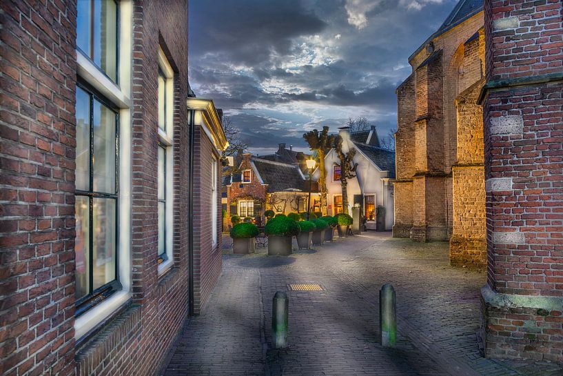 Typical Dutch village with church wall and small houses in Loenen aan de Vecht by Jan van Dasler