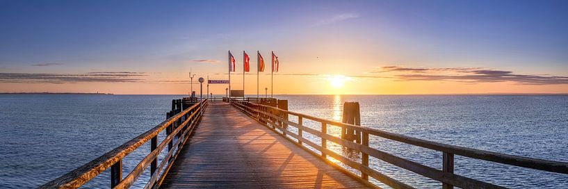 Old pier of Scharbeutz in the sunrise. by Voss photography