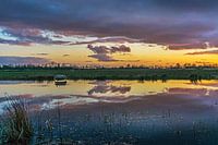 Coucher de soleil dans le polder du moulin à vent de Grootegaster