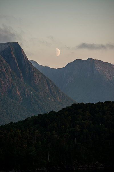 Moon over mountains in Norway by Ellis Peeters