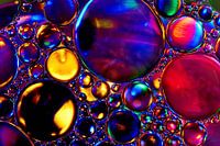 Olie druppels op water