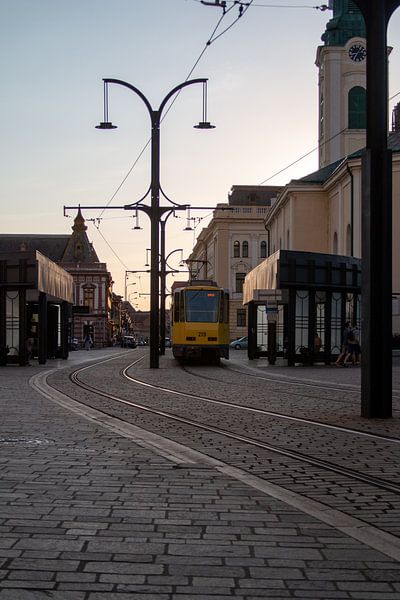 City face with a streetcar by Sebastian Stef