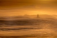 Vuurtoren in het gouden avondlicht