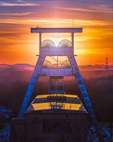 Les silhouettes marquantes du double bock ( puits 7), encadrées par le jeu de couleurs du coucher de soleil, créent une esthétique incomparable et unique.