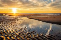 Sonnenuntergang am Strand von Kijkduinse in Den Haag