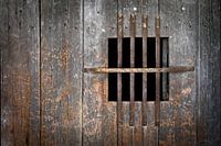 Wood door with peephole in Buis-les-Baronnies in France