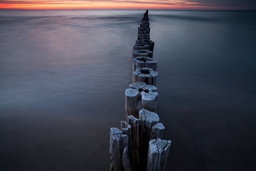 Baltic Sea groynes in the sunset by Jiri Viehmann
