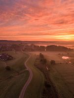 The dike towards Ameronegn during a beautiful sunrise
