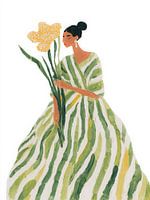 Femme élégante en robe verte avec une grande fleur