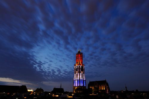 Cityscape of Utrecht with red-white-and-blue Dom tower during the start of the Tour de France by Donker Utrecht
