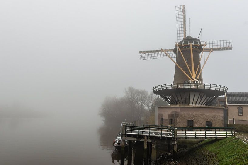 Mill in the fog along the Water by Brian Morgan