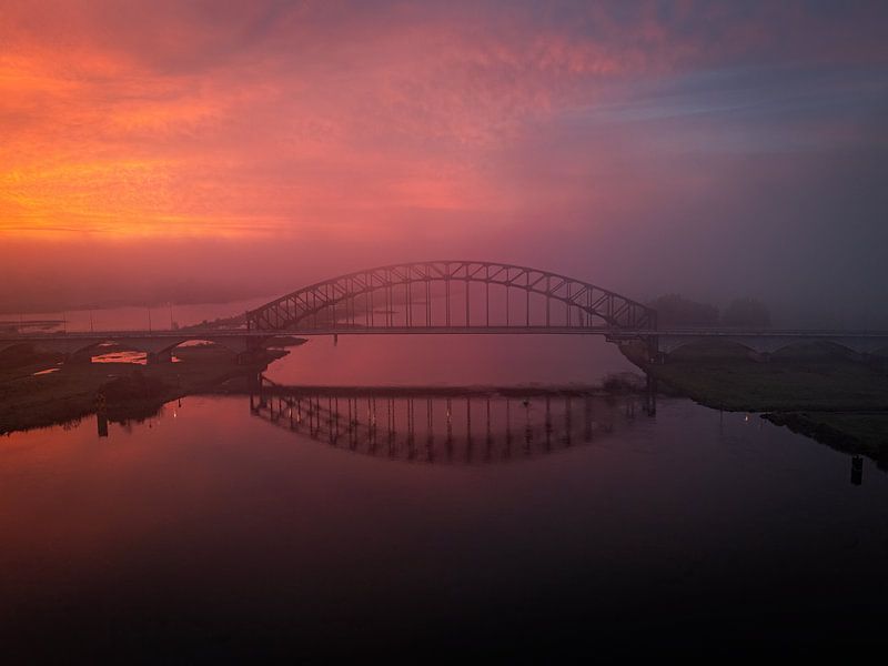 Misty eights over the IJssel by Thomas Bartelds