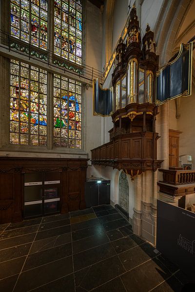 The Transept Organ in the Nieuwe Kerk in Amsterdam dates from the 16th century. Until the completion of the main organ in 1655, this transept organ was the only instrument in the church. After that, it was played when the church was open, but not during services. After 1700, it fell into disuse.  About the image maker: as a born and bred Amsterdammer, Peter feels a close connection with the city of Amsterdam. Over the years, he has captured the city of Amsterdam in many iconic works. Other cities at home and abroad also fill his portfolio. Landscape and macro photography are also part of his work. As a digital artist, he has now also earned his spurs, especially with adaptations of old masters.  Peters' work is widely sold and hangs on walls in various European countries. by Peter Bartelings