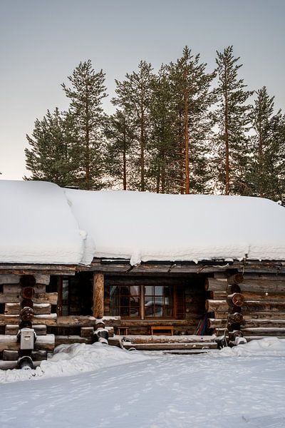 Cosy Cabin in the Snow in Lapland by Lone Drifters