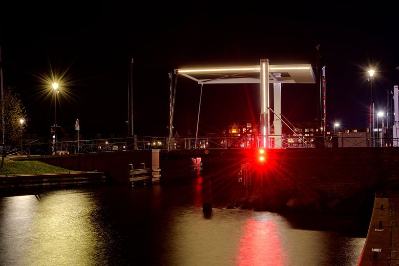 An illuminated bridge in Harderwijk by Gerard de Zwaan