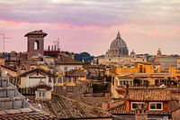 Pink sunset glow over the rooftops in Rome - Italy