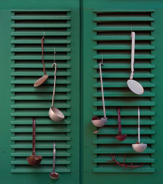 Wooden shutters with soup ladles by Adelheid Smitt