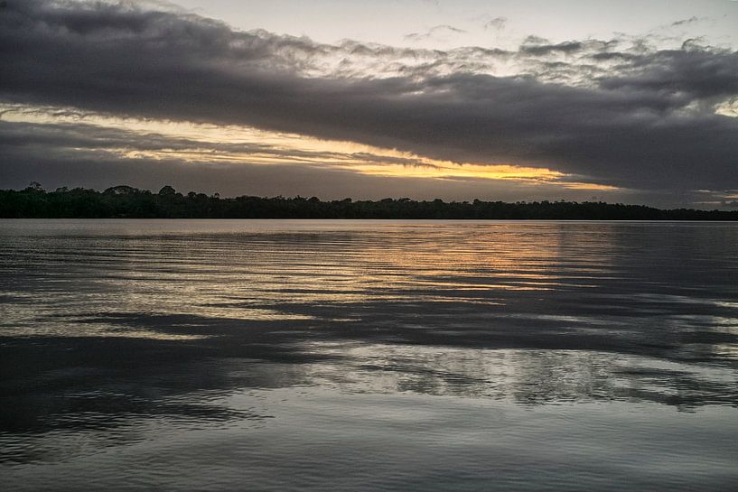 Sunset on the river in Suriname by Patricia Hofmeester