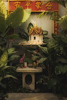 Botanical harmony: Thai shrine and prayer table